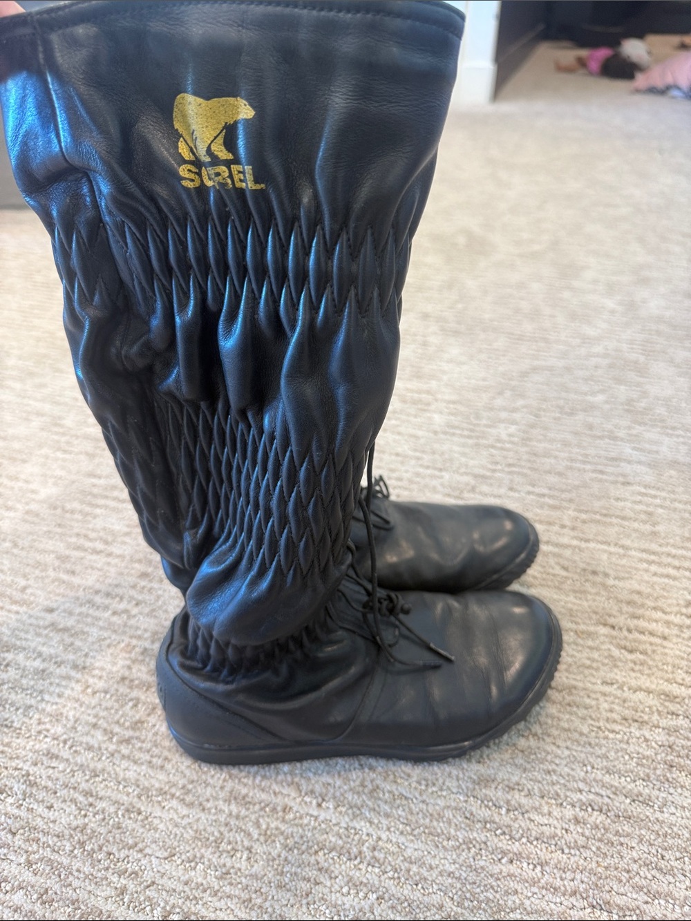 Sorel Black Leather Tall Lace-Up Boots with Gold Logo Accent